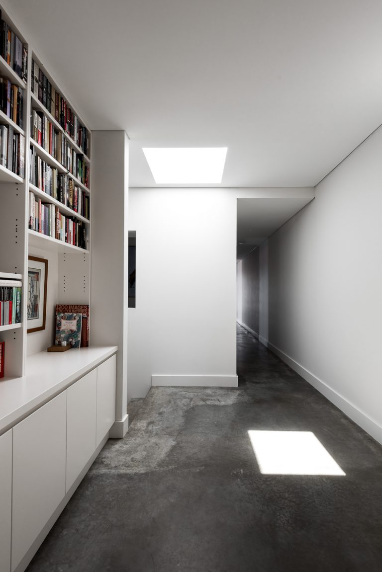18-hallway-bookcase-urban-house-western-suburbs-architect-Robeson-Architects